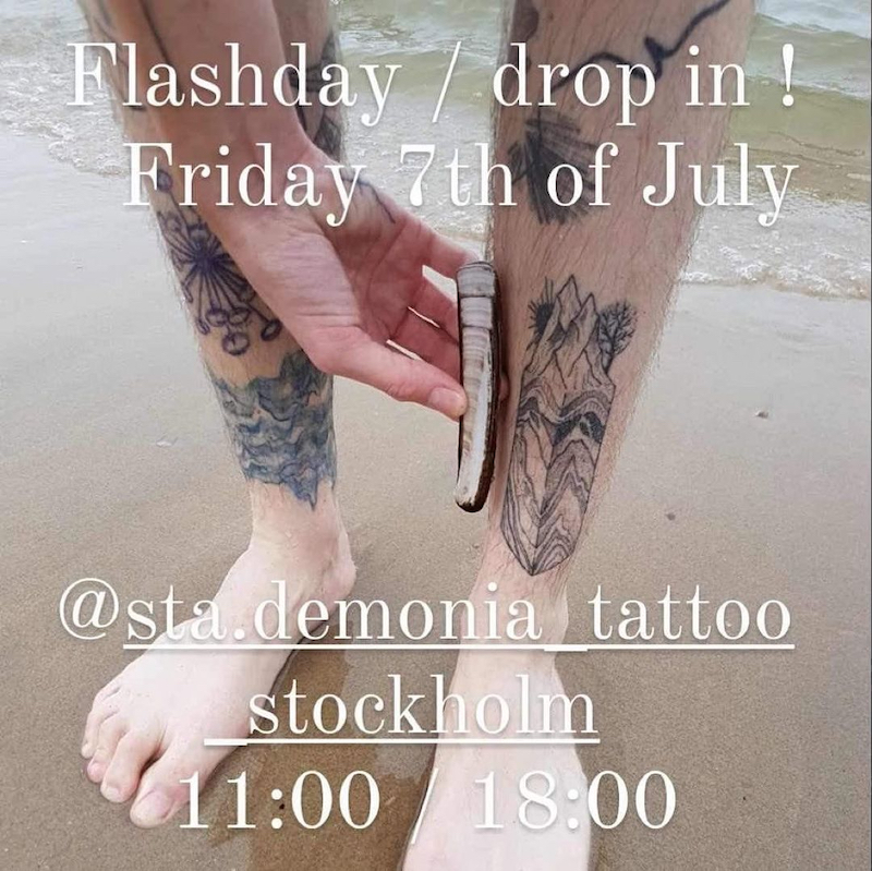 Tattooers at StaDemonia Tattoo invites to flash day. Feets at a shore and hand holding shell next to tattooed legs.
